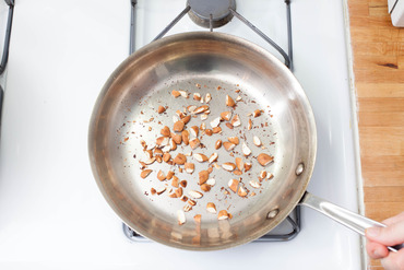 Toast the almonds: